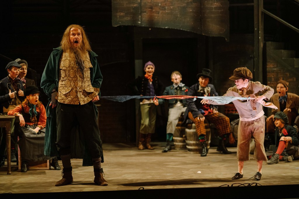 YorkLight-Oliver-2020-Photographer Tom Arber-Rory Mulvihill (Fagin), Matthew Warry (Oliver) and young persons ensemble